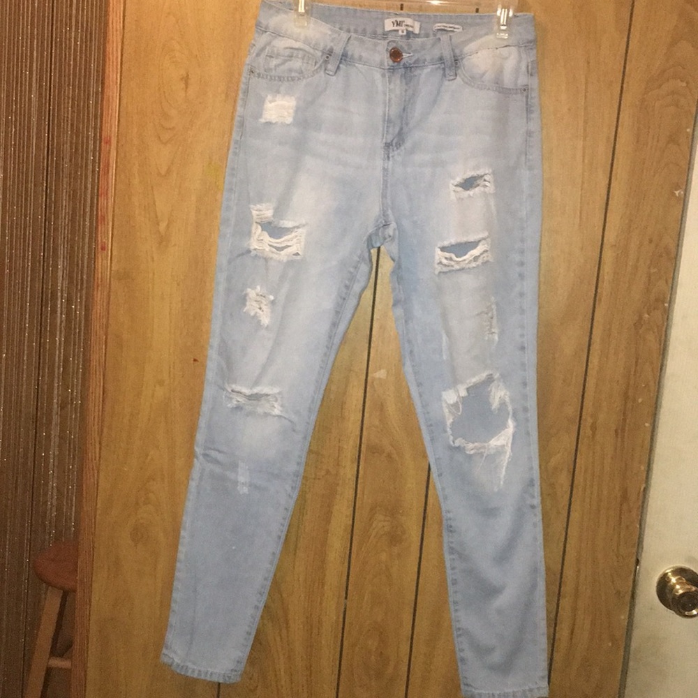 Light blue distressed jeans